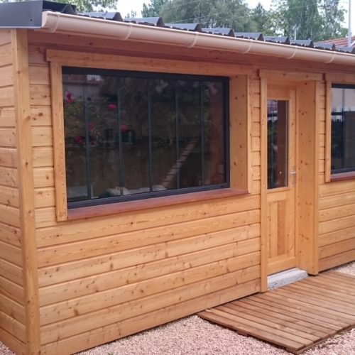 Extension ossature bois bardage Mélèze couverture bac acier à Vichy