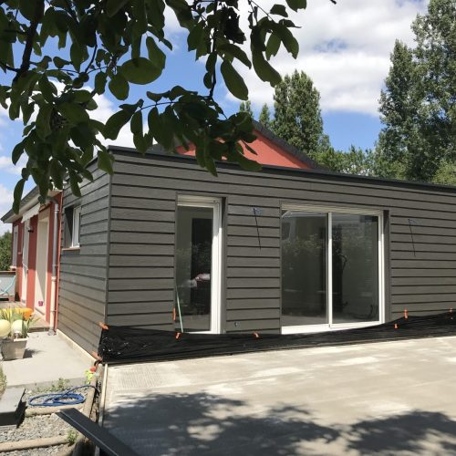 Extension ossature bois bardage ciment couverture membrane d&rsquo;étanchéité à Abrest