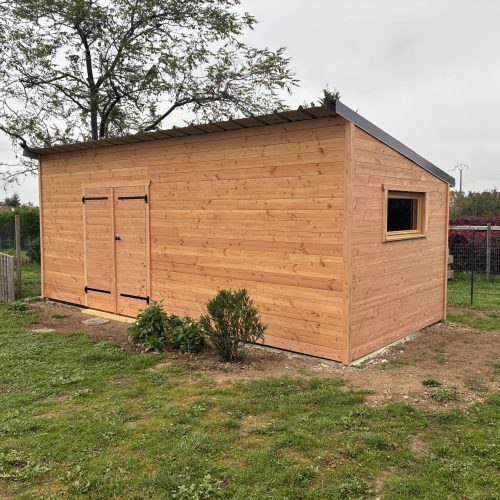 Abris de jardin bardage Douglas couverture bac acier à St Didier la Forêt