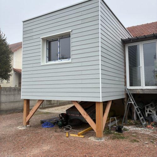 Extension ossature bois bardage ciment couverture membrane d&rsquo;étanchéité à Gannat