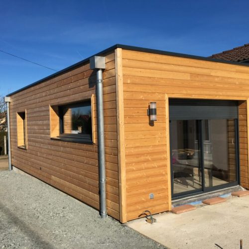 Extension ossature bois bardage Mélèze couverture membrane d&rsquo;étanchéité à Molles