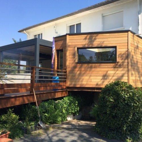 Extension ossature bois bardage Red Cedar couverture membrane d&rsquo;étanchéité à Bellerive sur Allier
