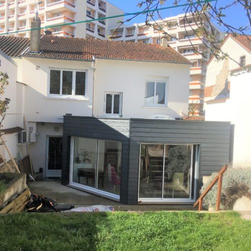 Extension ossature bois bardage ciment couverture membrane d&rsquo;étanchéité à Vichy