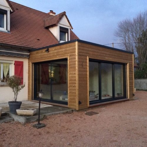 Extension ossature bois bardage Pin traité autoclave couverture membrane d&rsquo;étanchéité à Trévol