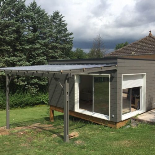 Extension ossature bois bardage ciment couverture membrane d&rsquo;étanchéité à Vendat