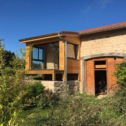 Extension ossature bois bardage Mélèze couverture tuiles à Lachaux