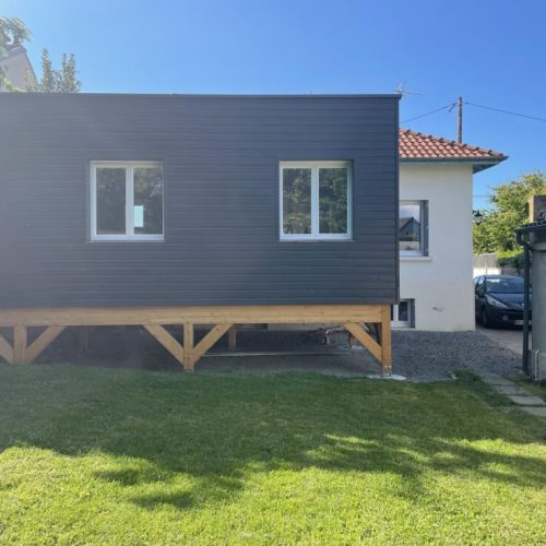 Extension ossature bois bardage bois peint couverture membrane d&rsquo;étanchéité à Bellerive sur Allier